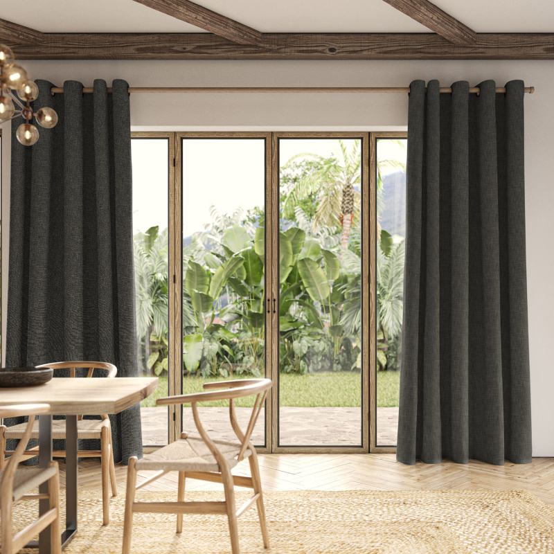 Anua Charcoal Plain Curtain in a deep, contemporary charcoal grey, hanging perfectly.
