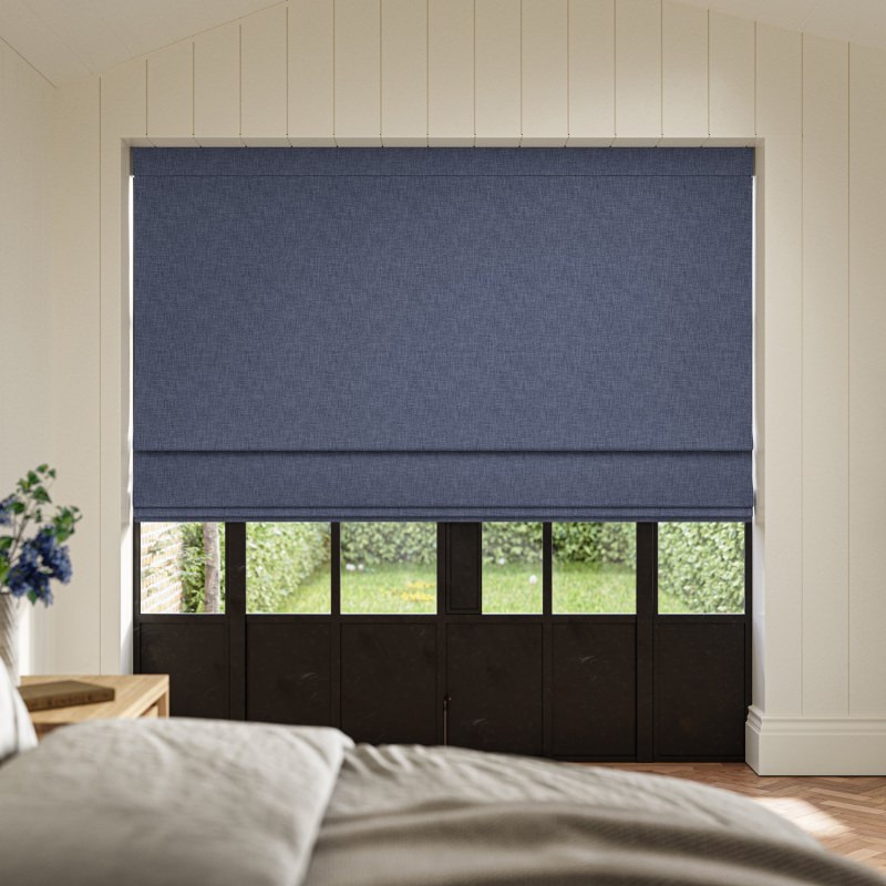 Anua Denim Plain Roman Blind in a timeless and relaxed muted blue, showing its tailored finish