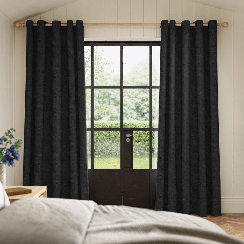 Cains Ink Jacquard Curtain in a deep inky blue-black with a bold, graphic woven pattern.