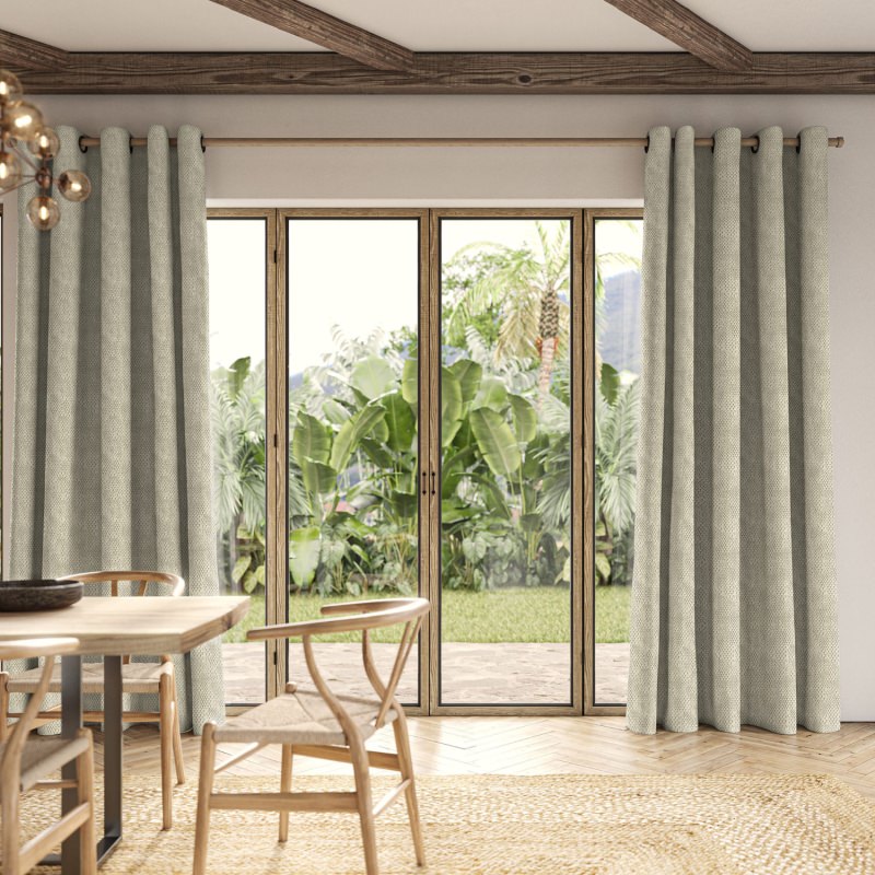 Cains Spruce Jacquard Curtain in a deep evergreen hue with a strong, textural weave.