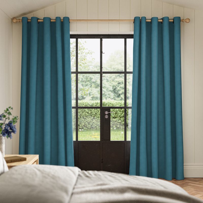 Cassandra Danube Velvet Curtain in a calming blue, made from a beautiful, soft velvet fabric.