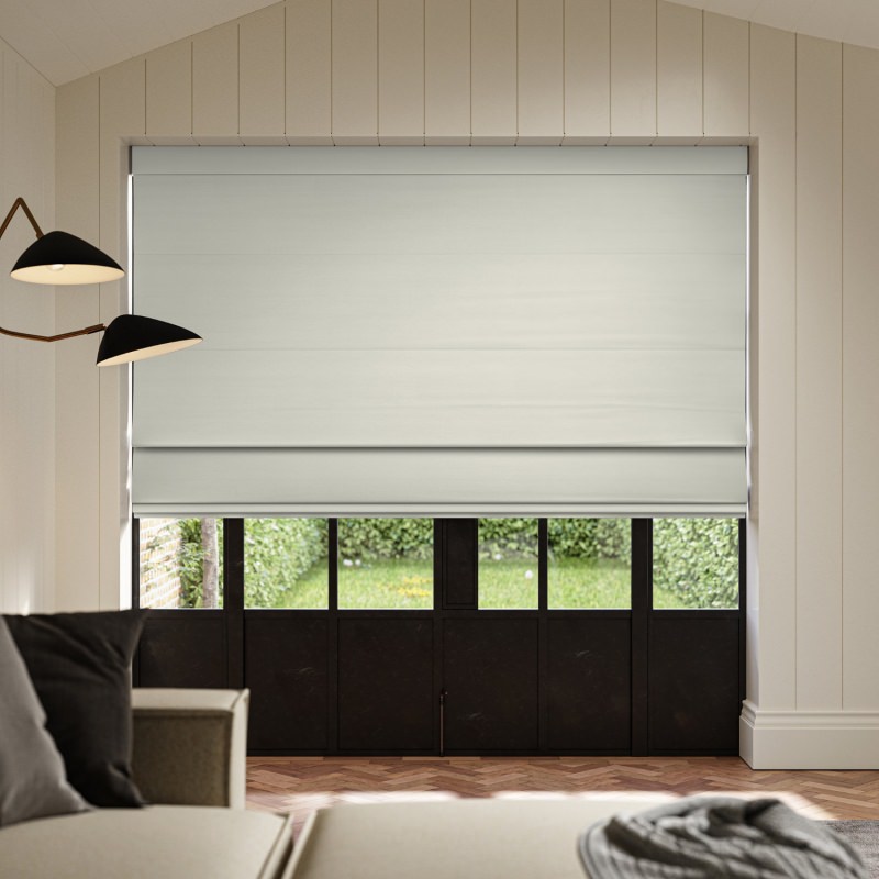Cassandra Frost Velvet Roman Blind in a cool, pale silver-grey with a shimmering velvet lustre