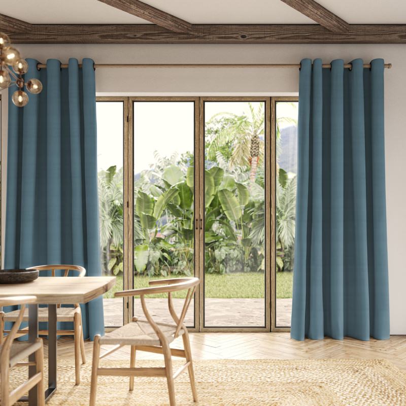 Cassandra Ocean Velvet Curtain in a rich, tranquil blue-green made from a plush velvet.
