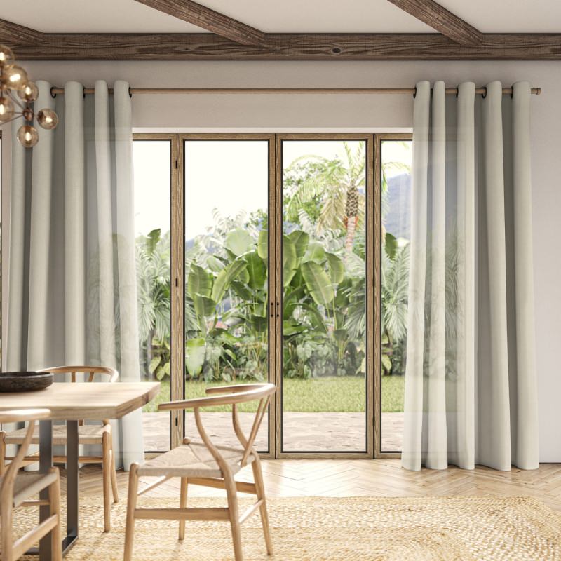 Dalkey Sand Sheer Curtain in a warm sandy hue, offering a relaxed and natural look.