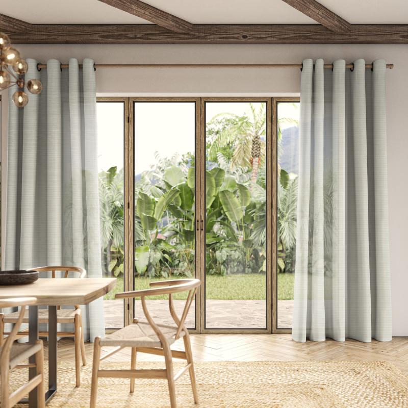 Dursey Pebble Sheer Curtain in a natural grey, gently diffusing sunlight.