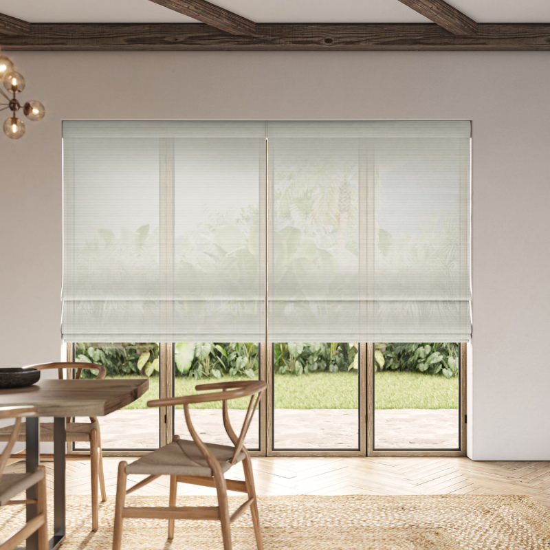 Dursey Pebble Sheer Roman Blind in a natural grey, gently diffusing sunlight