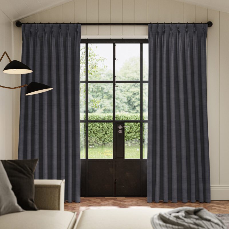 Ernest Graphite Plain Curtain, a strong and sophisticated dark grey fabric hanging in sleek folds.