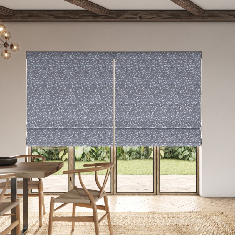 Jodie Danube Jacquard Roman Blind in a cool blue, showing the detailed jacquard weave on the flat blind