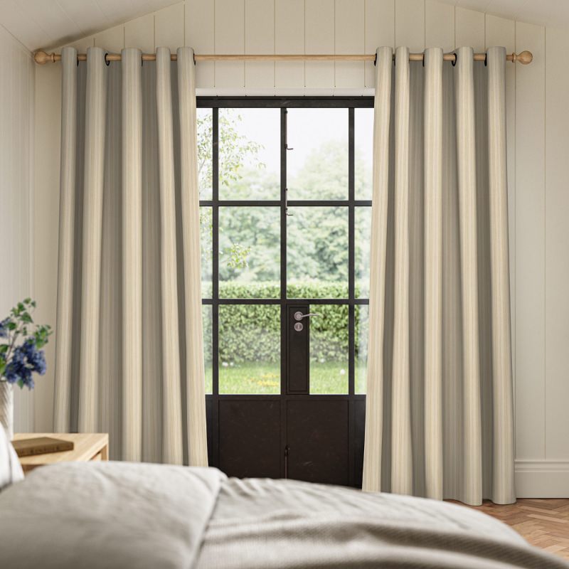Mazeau Moss Woven Curtain in a deep, earthy green with a beautiful, crafted woven texture.