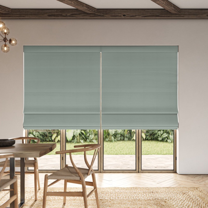Meryl Sage Pocketed Roman Blind in a gentle sage green, showcasing its smart, pocketed construction