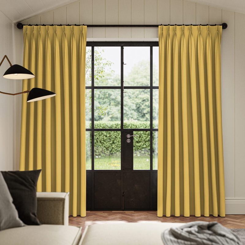 Meryl Sunflower Pocketed Curtain in a cheerful yellow, with a casual rod pocket heading.