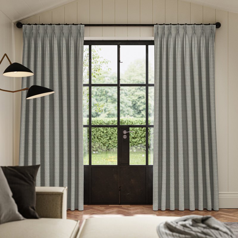 Pacino Denim Jacquard Curtain showing the subtle woven texture of the cool blue fabric.