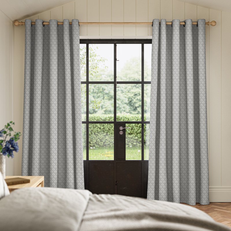Paros Silver Jacquard Curtain with a shimmering silver jacquard weave that catches the light.
