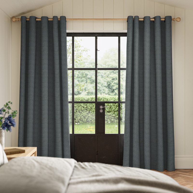 Penelope Chambray Boucle Curtain with its cosy, contemporary, and tactile blue looped fabric.