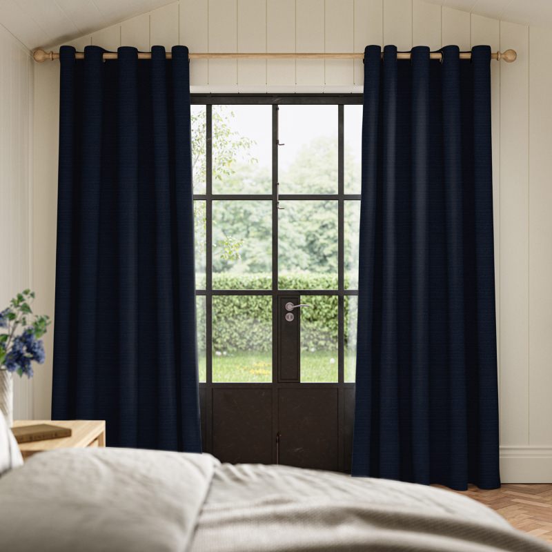 Penelope Prussian Boucle Curtain in a deep, rich blue with a sumptuous, heavy boucle texture.