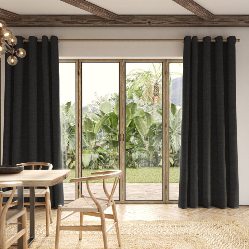Penelope Raven Boucle Curtain in a dramatic black, showcasing its deep, looped, tactile weave.