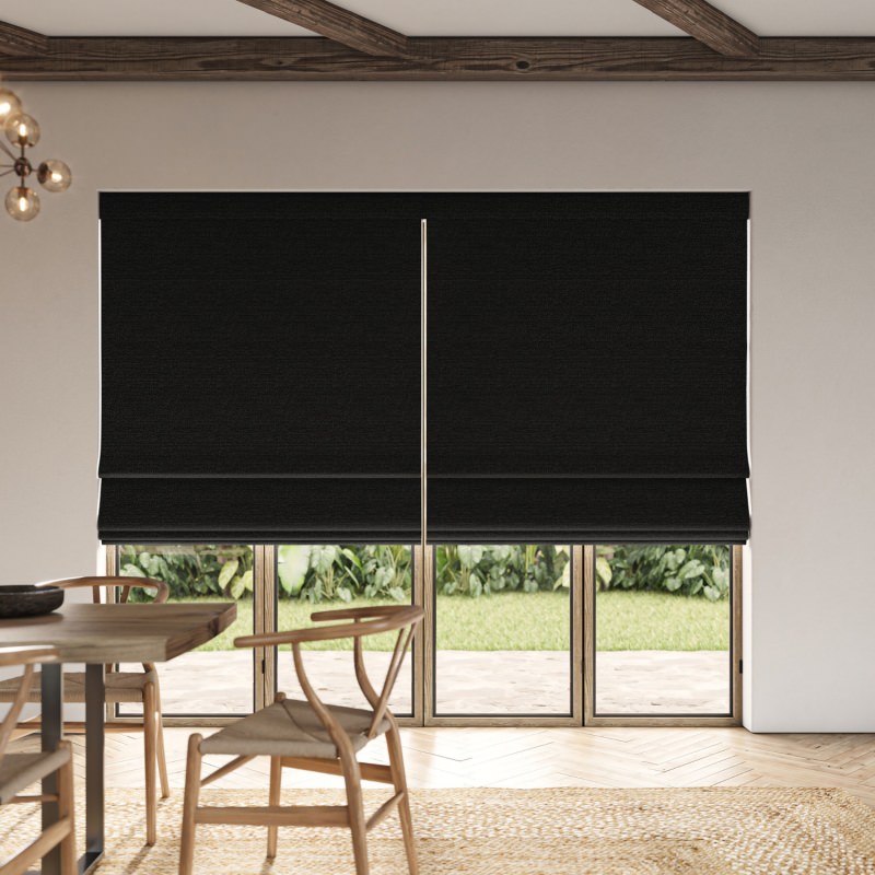 Penelope Raven Boucle Roman Blind in a dramatic black, showcasing its deep, looped, tactile weave