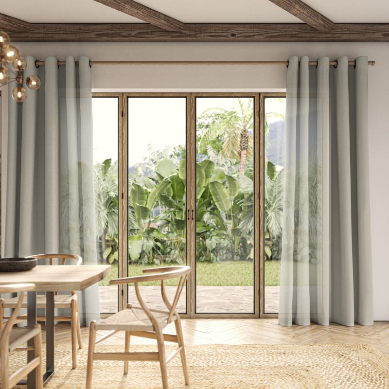 Rathlin Pebble Sheer Curtain, a natural grey sheer fabric, gently diffusing daylight.