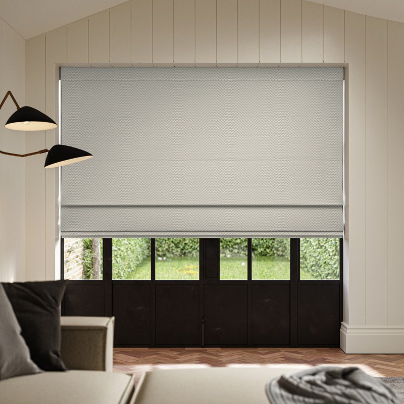 Wright Silver Jacquard Roman Blind in a cool, shimmering silver with a sophisticated geometric weave